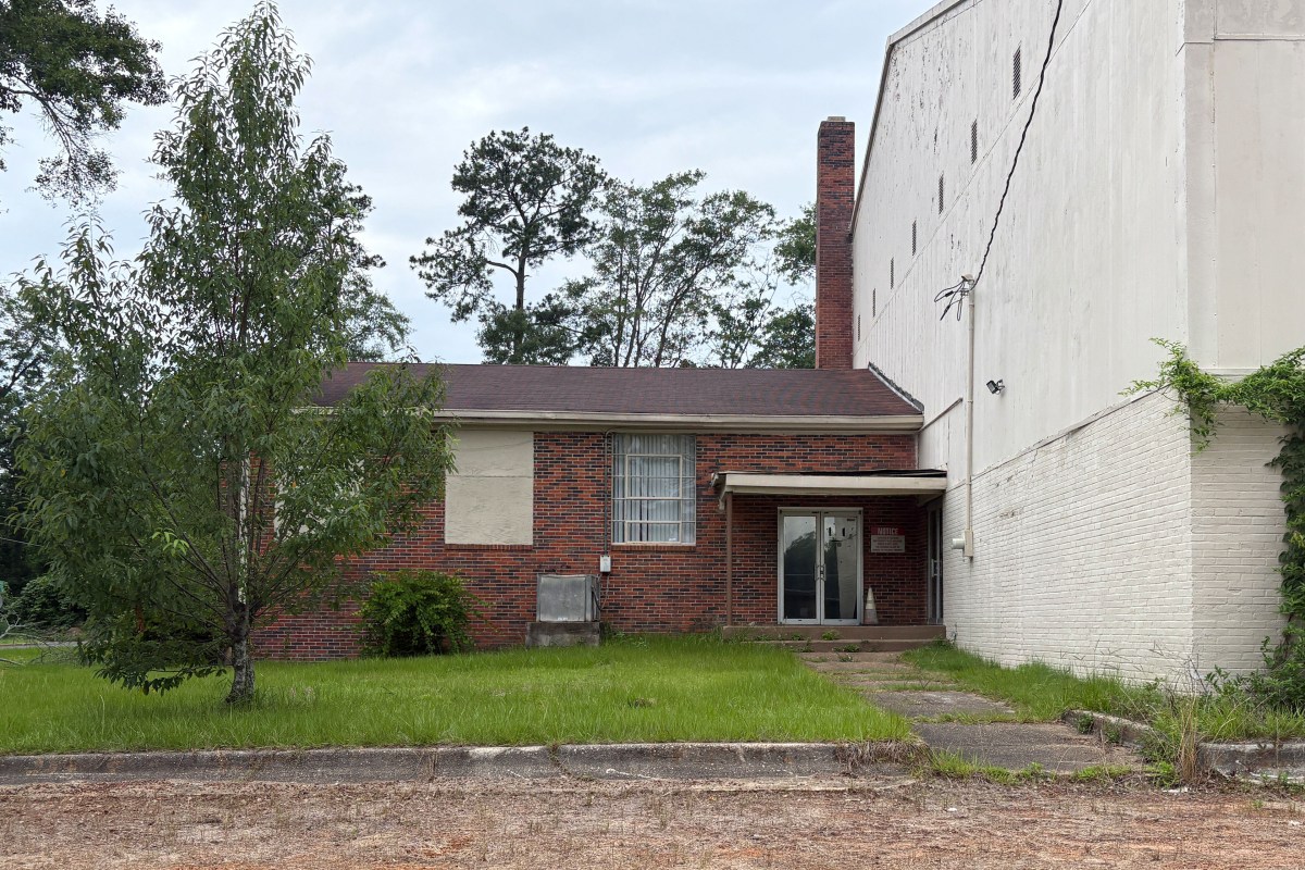 thomasville_06-min An exterior photo of a brick building attached to a larger white building.