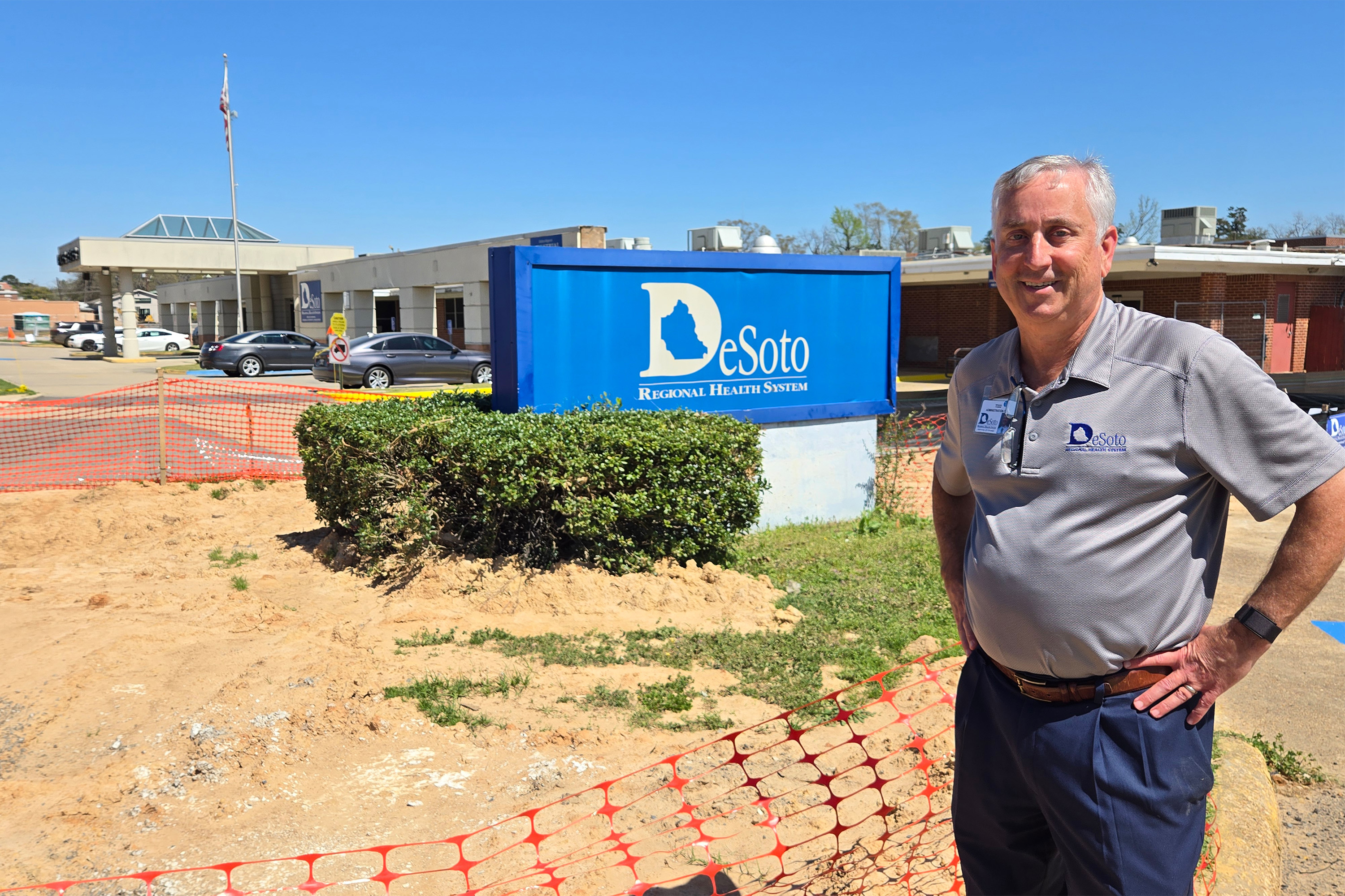 eppler_desoto_01 A photo of Todd Eppler posing by a sign for Desoto Regional Health System.