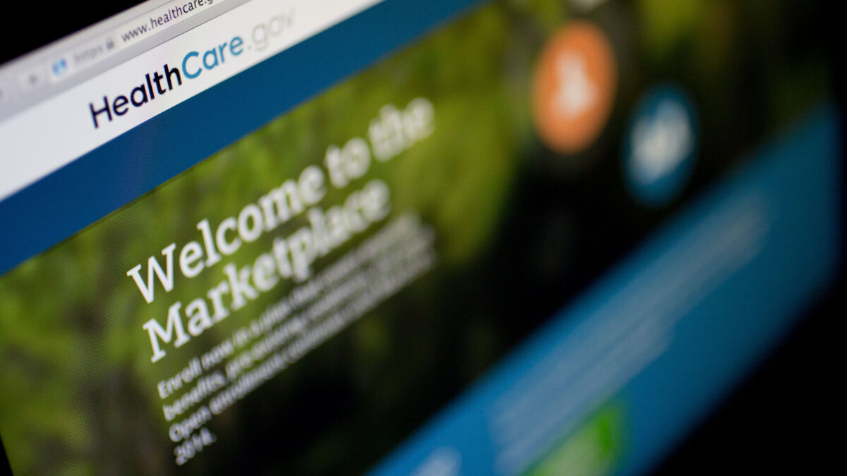The Healthcare.gov website is displayed on a laptop computer.