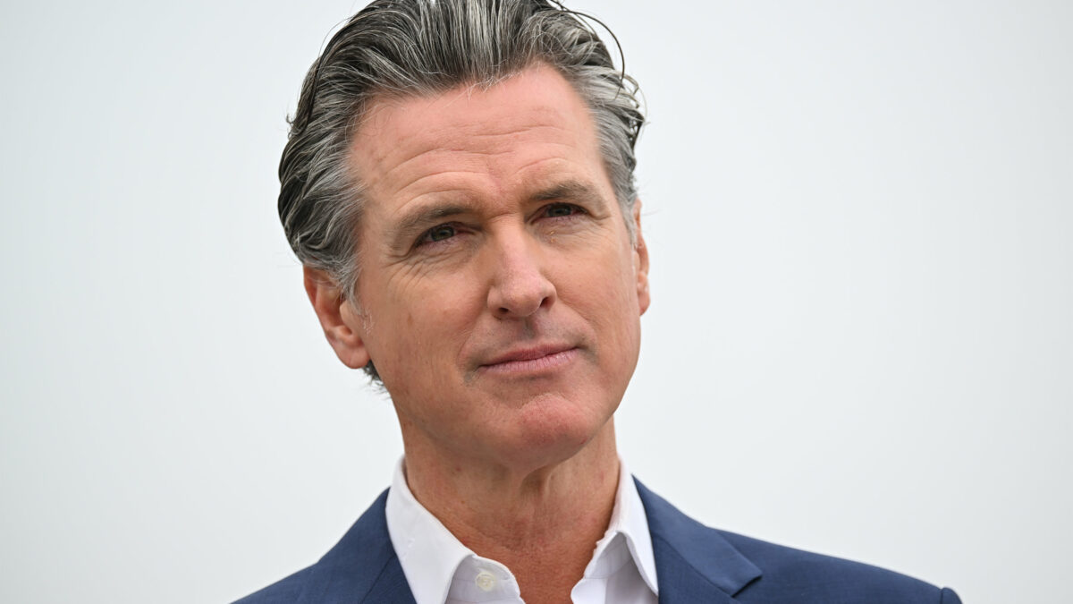 A photo of Gavin Newsom outside.
