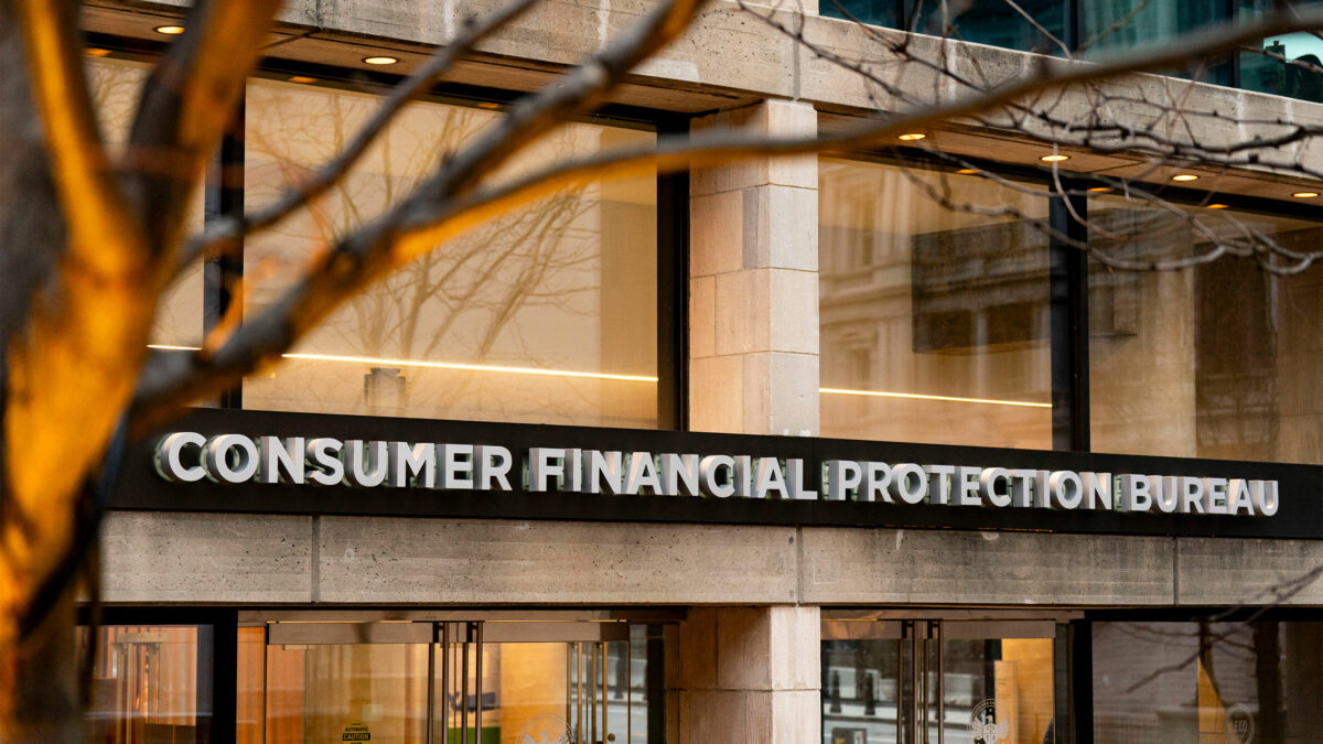 A photo of the CFPB headquarters. A tree is seen in the foreground.