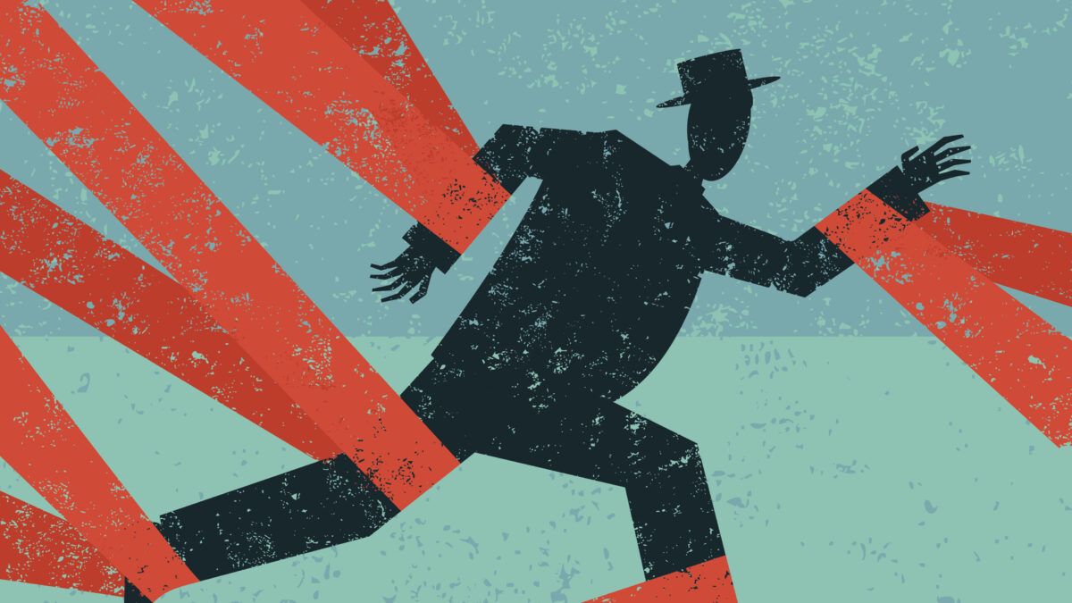 An illustration of a man with arms and legs bound by red tape.
