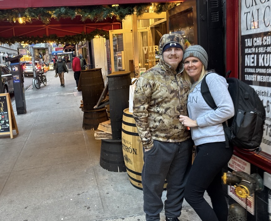 henderson_01 A photo of Mason Henderson and his mother, Tabitha Lowe, outside a shop in New York.