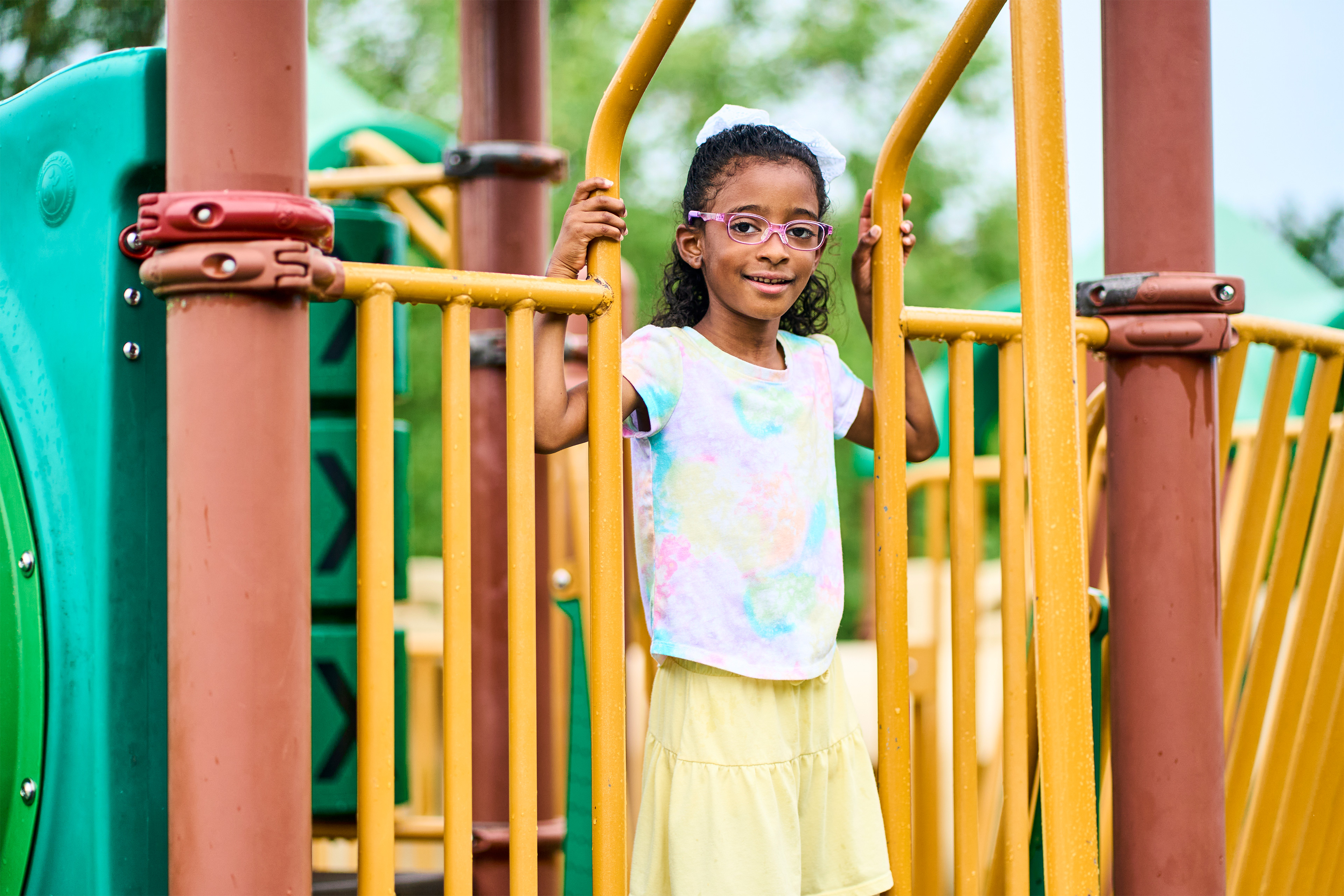 jones_001-resize A photo of Chloë Jones standing for a photo at a playground.