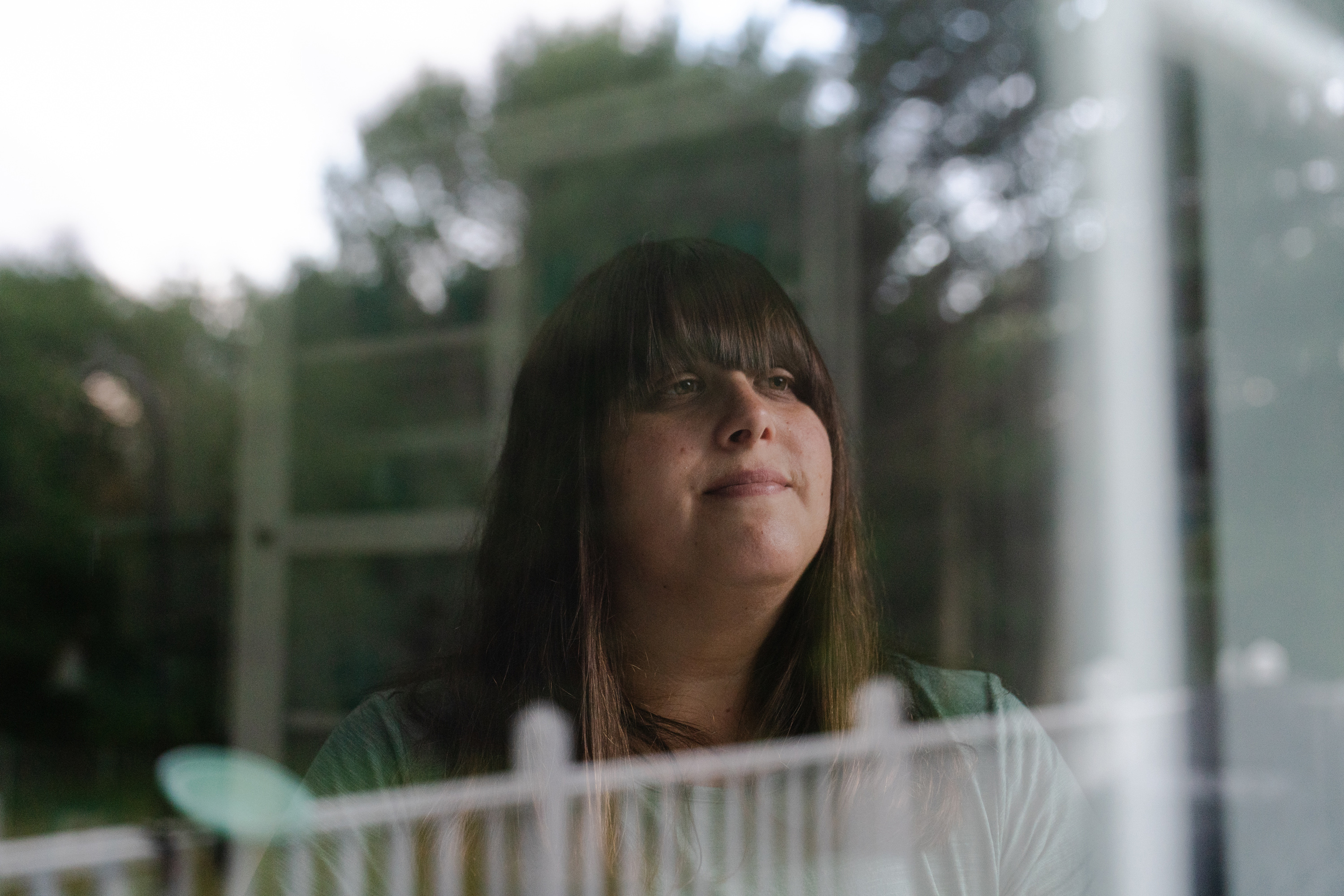 kahn_10 A portrait of Erica Kahn looking out the window.