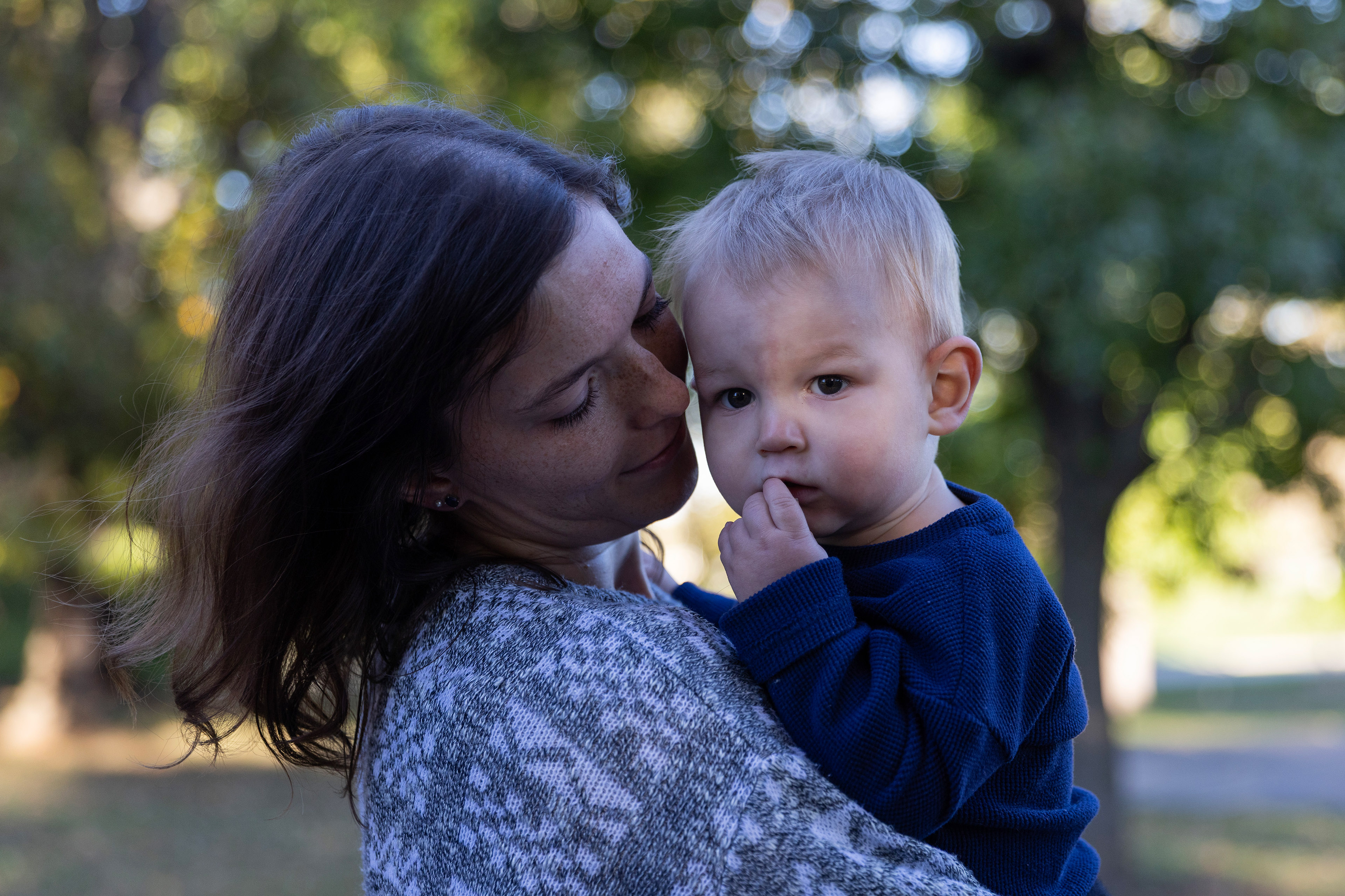 Elisabeth Yoder nuzzling her son's cheek.