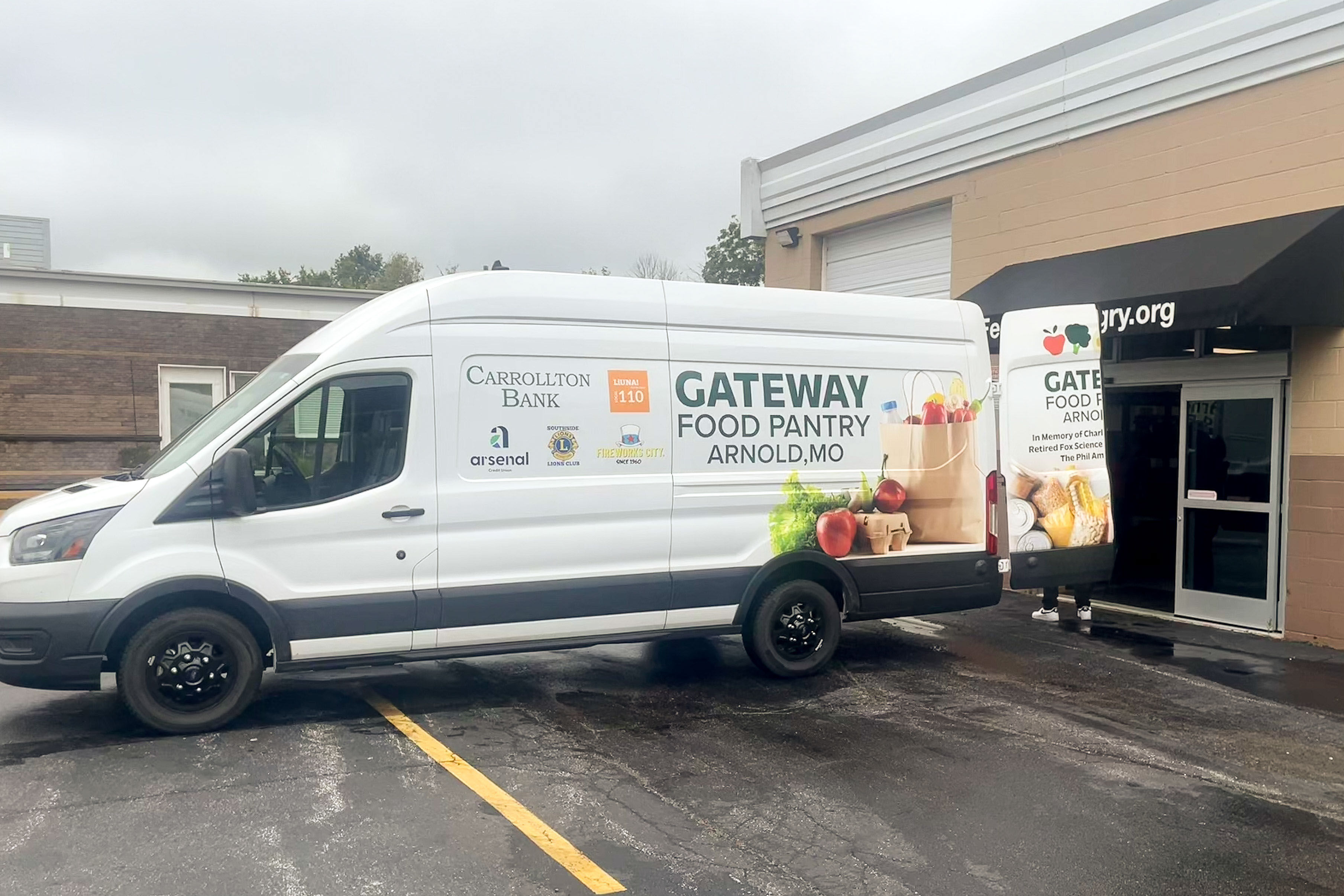 snap_01 A white van with the words "Gateway Food Pantry" in green on the side
