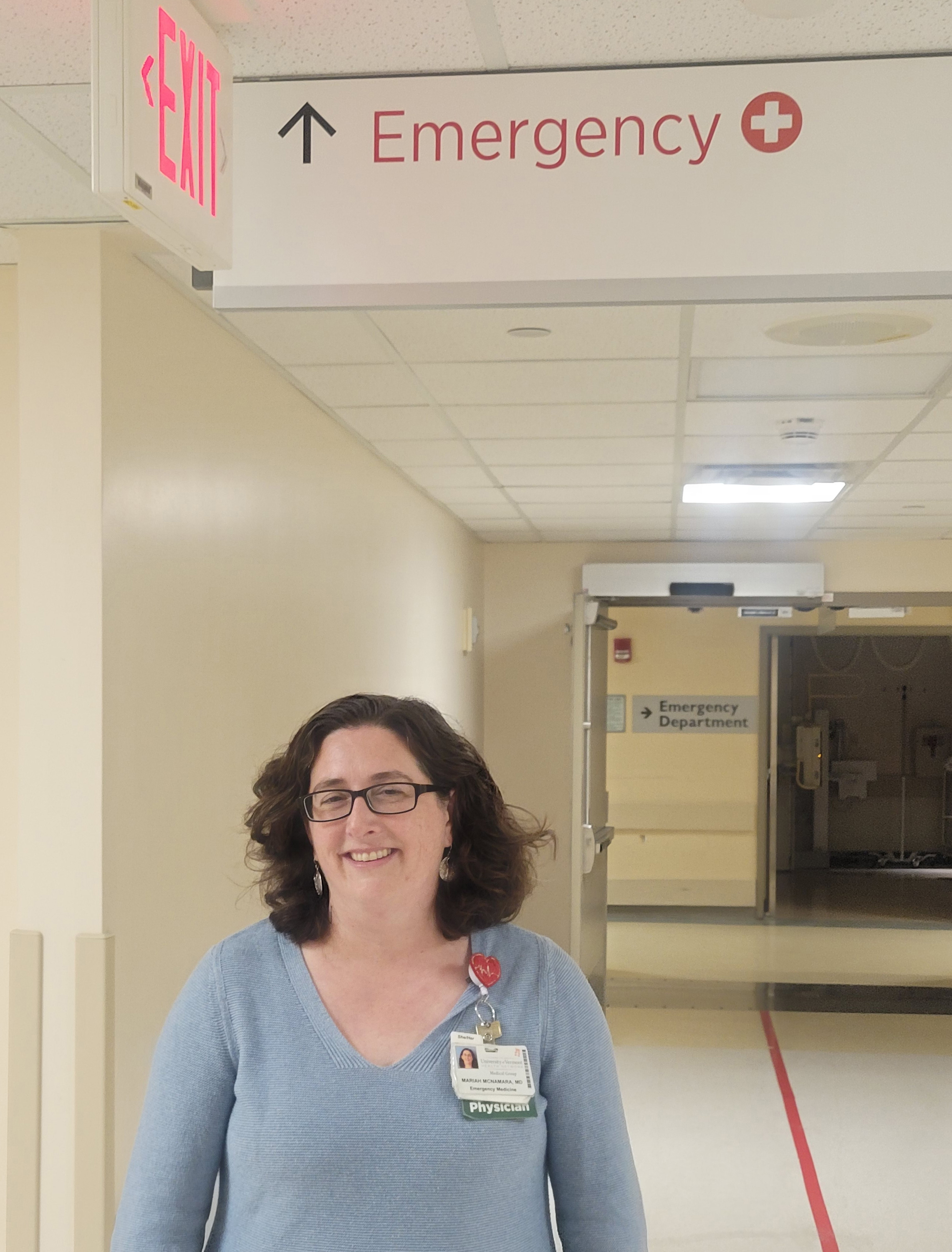vermont_03-resize A photo of a doctor standing in an ER hallway.